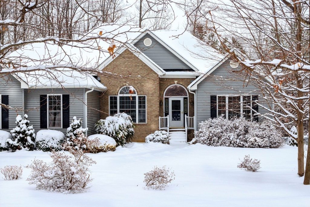 Vinyl siding and brick on house for accent. Mix and match example